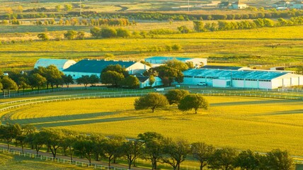 Beautiful view of a farm with grassy fields and trees in Frisco Texas - obrazy, fototapety, plakaty