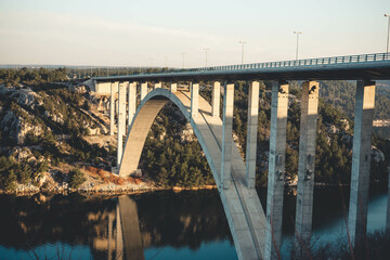 bridge over the river at sunset