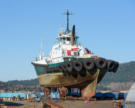 Anacortes, WA, USA - February 25, 2022; Tanker escort tugboat Garth Foss out of water in Anacortes with tires visible