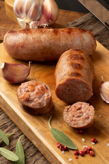 Traditional spicy sausage. Brazilian barbecue on cutting board.
