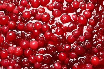 Fresh juicy cranberry sauce as background, closeup