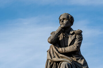 View of Lermontov monument against blue sky on sunny day. Pyatigorsk, Stavropol Krai, Russia.