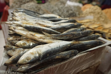 Pontianak, Indonesia - 02 December 2022: Picture of dried salted fish and shrimps in the Flamboyan Traditional Market, one of traditional market in Pontianak.