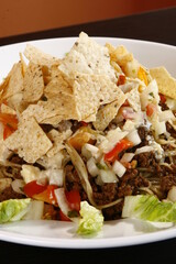 Party spaghetti with nachos for topping