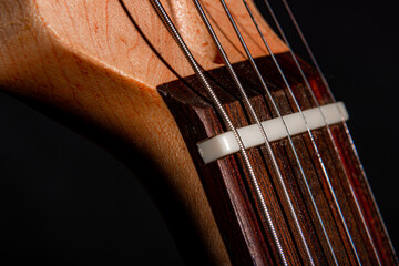 Electric guitar nut closeup
