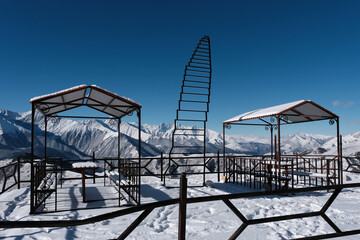 Viewpoint on Tsey Loam pass on sunny winter day. Ingushetia, Caucasus, Russia.