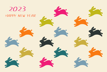 2023年卯年　ウサギがたくさんのカラフルな年賀状テンプレート
