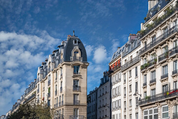 Fototapeta na wymiar Paris, typical facades and street, beautiful buildings avenue de la Republique 