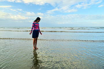 Asian girl on the beach