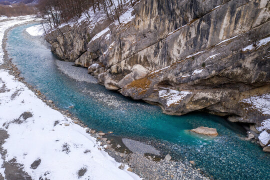 View of Ardon river in Alagir gorge on cloudy winter day. North Ossetia, Russia.