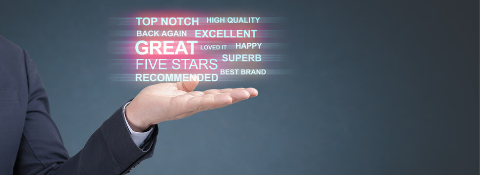 Businessman's hand holds positive feedback about his service, business, product. Great feedback. Good service, application company evaluation. Consumer satisfaction survey. copy space