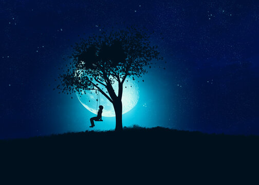 Girl on swing under tree at night