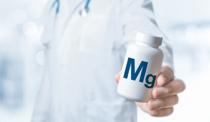 Magnesium, Mg, Mg supplements for human health. Doctor recommends taking Magnesium. doctor talks about Benefits of Mg. Essential vitamins and minerals for humans. Magnesium Health Concept. - obrazy, fototapety, plakaty