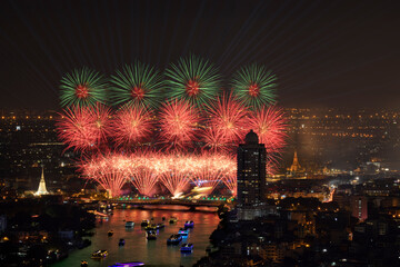 Beautiful fireworks and iconic Bangkok landmarks are illuminated by light displays and projection mapping during the Vijit Chao Phraya festival.