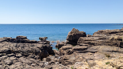 Fototapeta na wymiar rock stone access to the beach vendee Atlantic in france