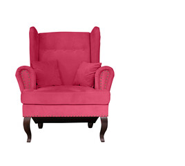 Magenta soft chair with pillows on wooden legs. Upholstered furniture for the living room. Viva magenta armchair isolated