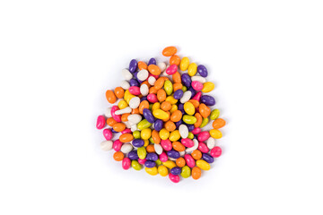 Fennel seed candy in a pile isolated over white top down view