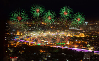 Top view of Chao Phraya River with The Grand Palace , Wat Pho and Wat Arun  in new year fireworks and  projection mapping during the Vijit Chao Phraya festival performance.