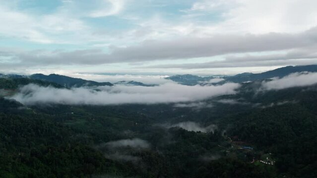 Top view Landscape of Morning Mist with Mountain Layer at north of Thailand. mountain ridge and clouds