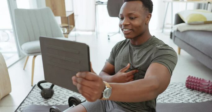 Home, social media and fitness influencer with tablet live streaming dumbbell workout for online video tutorial. Vlog, black man filming arm exercise and training coach recording multimedia broadcast