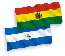 Obraz premium Flags of Nicaragua and Bolivia on a white background