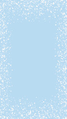 Beautiful snowfall christmas background. Subtle flying snow flakes and stars on light blue winter backdrop. Beautiful snowfall overlay template. Vertical vector illustration.