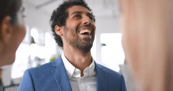 Laugh, office and group of business people, talking or chatting or casual conversation. Company, comic and happy business man speaking with women in workplace, joking and enjoying break time together
