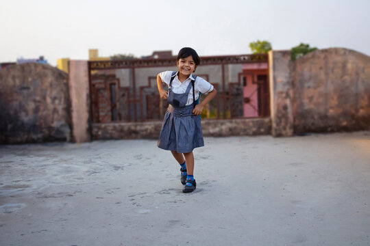 Happy Rural Indian School Girl Going To School