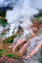 Aerial view to hot geysers. A drone view of the Kamchatka mountains. - 551041763