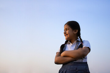 Rural Indian school girl looking away