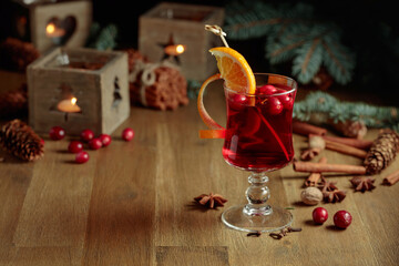 Christmas drink with spices, orange, and cranberries.