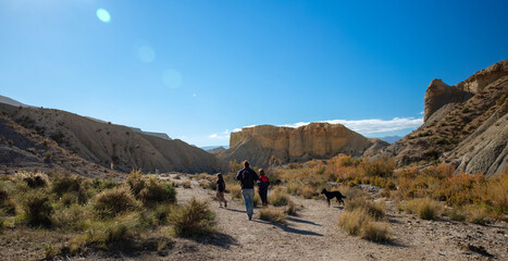 Family walking in Tabernas desert- Andalusia in Spain