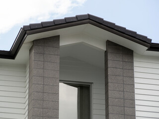 Modern gable porch roof with pilasters
