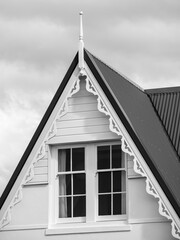 Gable roof with finial and carved fascia