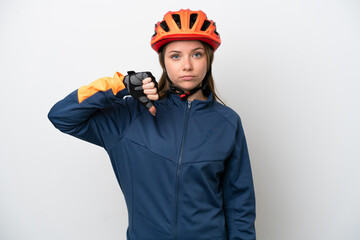 Young cyclist Lithuanian woman isolated on white background showing thumb down with negative expression