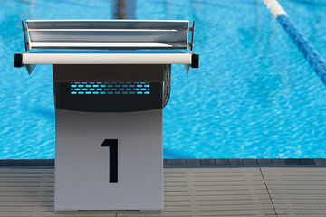 Starting platforms with number 1 for swimming races and competitions. Swimming pool starting block...