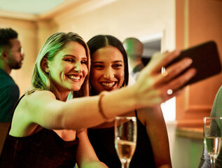 Party, phone or friends taking a selfie for social media content or to post happy profile pictures on ladies night. Event, girls or women take a photo with wine or champagne drinks for a celebration
