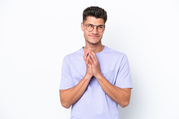 Young caucasian man isolated on white background scheming something