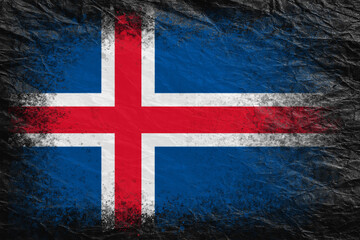 Flag of Iceland. Flag is painted on black crumpled paper. Paper background. Copy space. Textured background