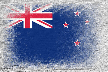 Flag of New Zealand. Flag is painted on a cement wall. Cement background. Plastered surface. Copy space. Textured background