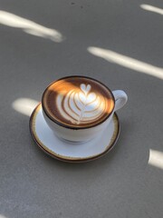 Hot coffee cup on table