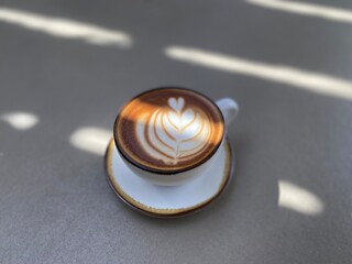 Hot coffee cup on table