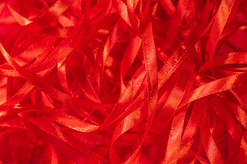 Romantic scarlet background from a red silk ribbon. Abstract background for Valentine's Day,...
