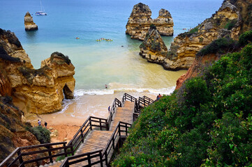 wooden steps leading to Camilo beach - Praia do Camilo, near Ponta da Piedade, Lagos, Algarve, Faro district, Portugal, Europe
