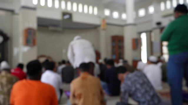 Blurry background islamic men pray in mosque in Friday. gathering in mosque.