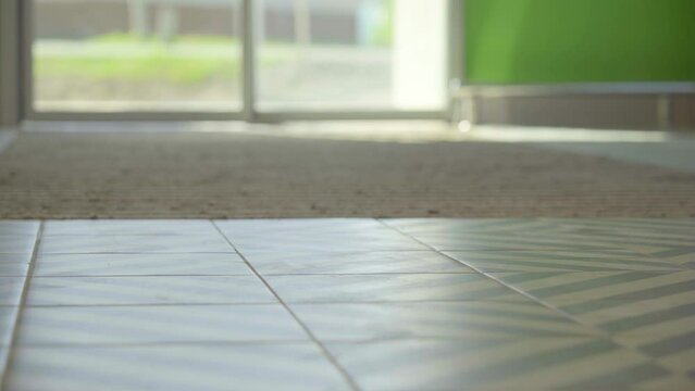 Automatic non-contact doors open and close. Close-up. Daylight sunlight