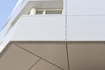 Detail of a aluminum cladding on a building facade. Restoration of a old building with aluminum metal composite panels