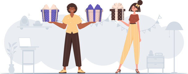 A man and a woman are holding a festive gift box in their hands. Gift concept for christmas or new year.