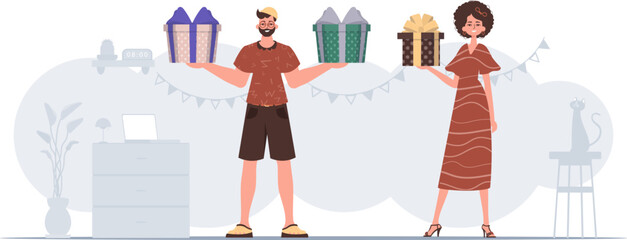 A man and a woman are holding a festive gift box in their hands. Christmas gift concept.