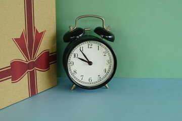 alarm clock and gift box - 551082315